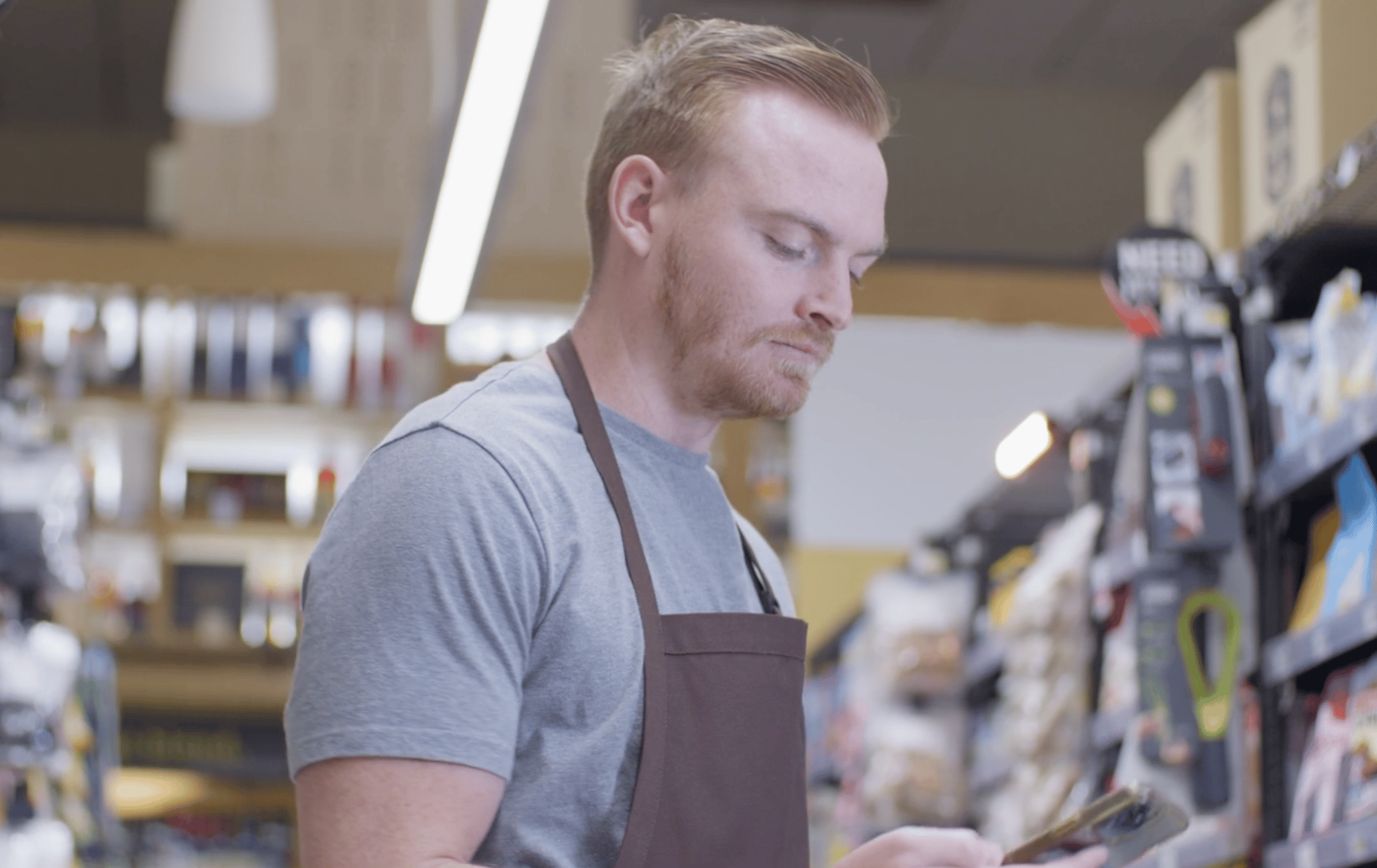 associate looking at mobile phone 